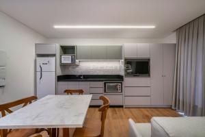 512 Flat Moderno e Bem Localizado a 120 metros da praia de Bombinhas Até 4 Pessoas