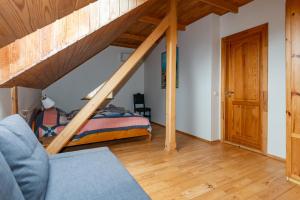 Apartamentas Jūratė 6-8 asmenims su sauna, privačiu kiemeliu prie jachtklubo.