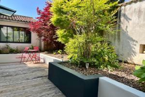 Maisons de vacances L'Hermione - Room in the heart of St Martin de Re : photos des chambres