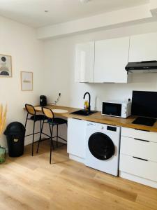 Appartements Le 32 - Studio renove - Centre : photos des chambres