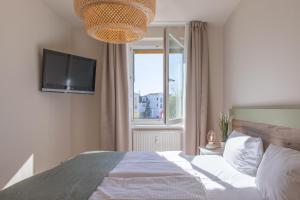 Küstenglück - Ferienwohnung im 1Obergeschoss mit Balkon