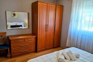 Apartments with parking space Palit, Rab - 24465