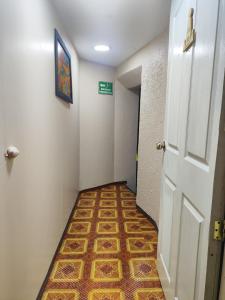 Hostal Latitud Ecuem