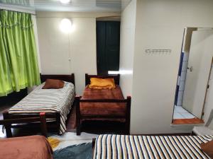 Hostal Latitud Ecuem