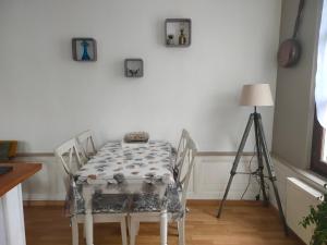 Appartements Appartement Cosy avec jardinet : photos des chambres