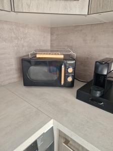 Appartements Maison caroline 1 : photos des chambres