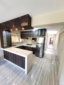 Departamento céntrico y familiar de tres habitaciones frente a parque