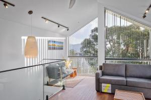 Modern Spacious Hillside Retreat with Scenic Views