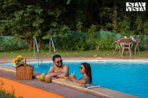 Nivaant Farms by StayVista - Green Retreat with Pool, Orchard, Jacuzzi & Gazebo
