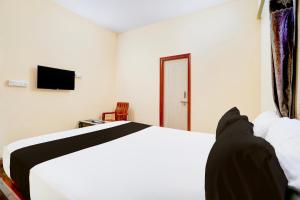 Hotel O Easynest Bharathi city