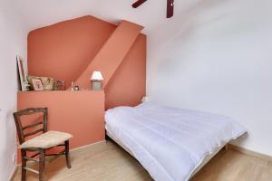 Maisons de vacances Maison pour 6 adultes - 2 enfants avec jardin : photos des chambres