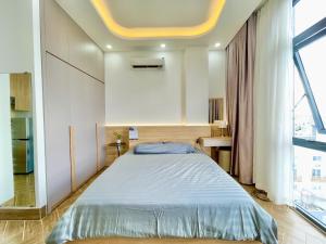 Dr 501 Modern studio with city view and kitchen