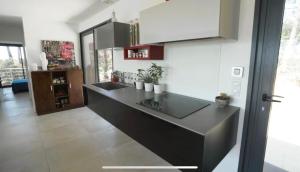 Villas La Villa du Bout du Monde, Pool & Jacuzzi : photos des chambres