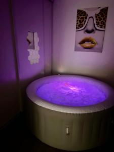 Appartements Escapade exotique -Terrasse Privee-Love&Jacuzzi : photos des chambres