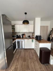 Superbe nid douillet 42m avec balcon et parking