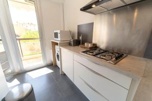 Appartements Magnifique Appartement, Piscine, Proche gare : photos des chambres