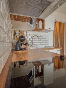 Appartements Studio cosy avec terrasse et vue mer imprenable : photos des chambres
