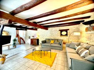 Maisons de vacances Grange authentique avec vue, piscine chauffee et Wifi : photos des chambres