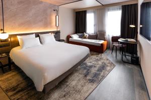 Hotels Novotel Paris Suresnes Longchamp : photos des chambres