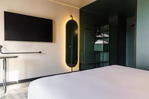 Hotels Novotel Paris Suresnes Longchamp : photos des chambres