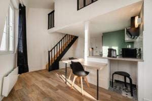 Appartements Le Petit Saint Martin - Duplex - Coeur de ville : photos des chambres