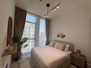 Ashri Luxe Apt Binghatti House located JVC