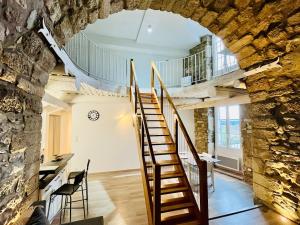 Appartements Charme unique sous les remparts : photos des chambres