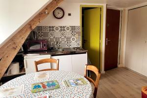 Studio centre-ville Tempête 8