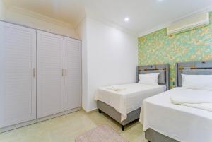 Kalkan Merkezde Modern, Havuzlu Dublex Apart