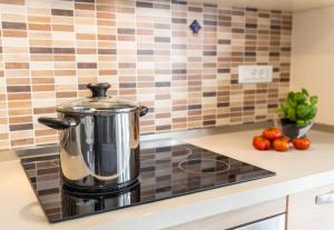 Sirio - bilocale comodo a 200 m dal mare e con piscina sul tetto