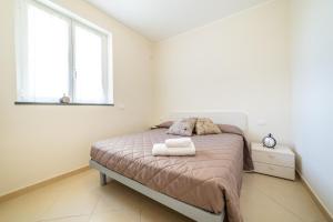 Sirio - bilocale comodo a 200 m dal mare e con piscina sul tetto