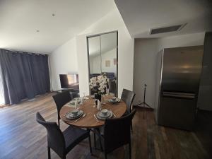 Appartements L- instant cosy climatise : photos des chambres