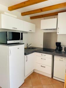 Maisons de vacances Gites le Fabras, espace de verdure, piscine collective et jeux : photos des chambres