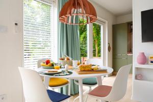 Ralreiger Chaletlodge met airco, tuin op het zuiden en fietsenberging