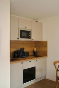 Les appart'hotels de la fontaine : photos des chambres