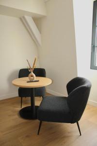 Les appart'hotels de la fontaine : photos des chambres