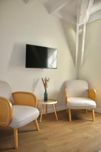 Les appart'hotels de la fontaine : photos des chambres