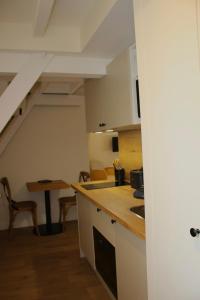 Les appart'hotels de la fontaine : photos des chambres