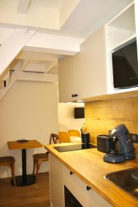 Les appart'hotels de la fontaine : Studio Lit King-Size Deluxe