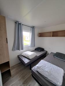 Campings Camping Sainte Mere Eglise : photos des chambres