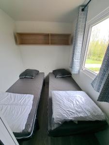 Campings Camping Sainte Mere Eglise : photos des chambres