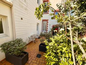 Appartements L-harmattan Studio T1 PREMIUM dans residence Privee avec Patio a proximite : photos des chambres