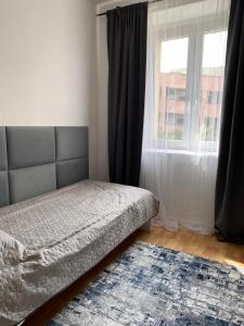 Eko Home - nowy apartament w centrum z prywatnym zadaszonym parkingiem