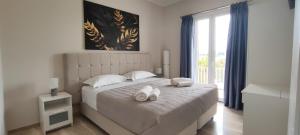 Two-Bedroom Apartment with Sea View room in Anna Apartments Kanoni