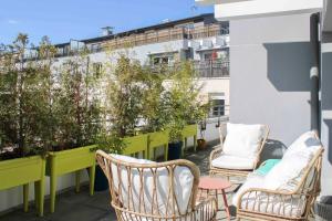 Appartements Apartment with balcony at the gates of Paris : photos des chambres