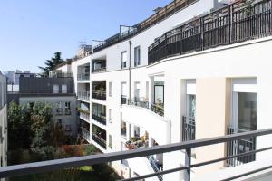 Appartements Apartment with balcony at the gates of Paris : photos des chambres