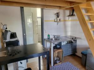 Appartements Studio quai de Loire hyper centre local a velo : photos des chambres