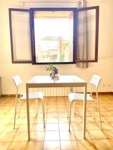 Appartements Studio des fleurs : photos des chambres