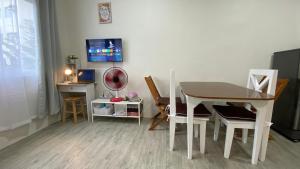 Nuvali Studio Retreat Free Pool Access & Fast WiFi