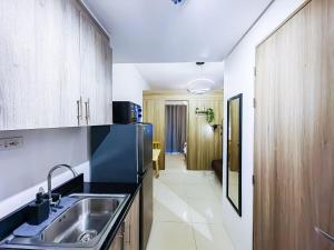 1BR Condotel with Balcony at FAME Residences #FM08-1